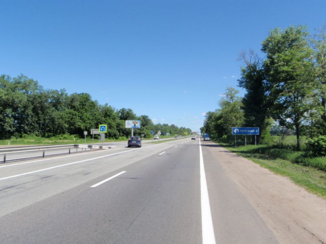 Щит 6x3,  Біля м. Біла Церква,  за КП ДАІ, поворот на с. Терезине, 77км+550 праворуч