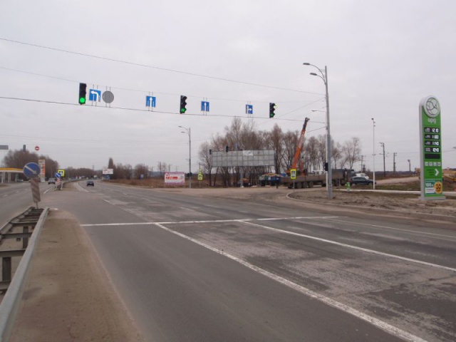 Щит 6x3,  Поворот на с.Ходосіївка, навпроти торг. центру "Мегамаркет в Ходосіївці"; 23+650 ліворуч