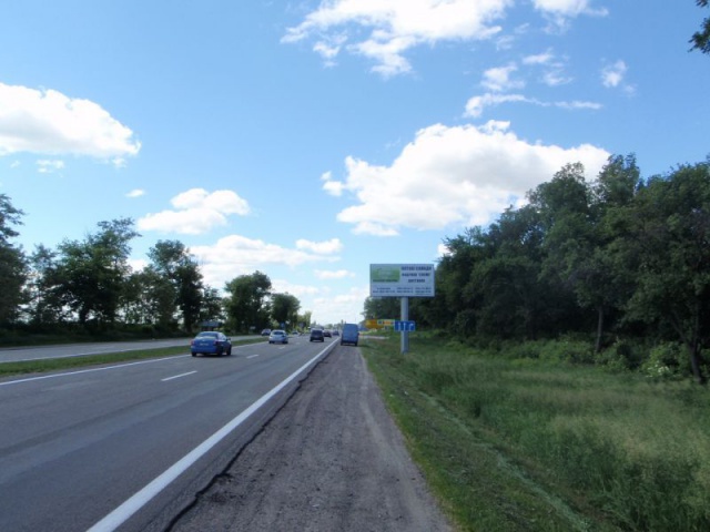 Щит 6x3,  Біля м. Біла Церква, перед КП ДАІ, перед поворотом на с.Терезине, 77км+550 праворуч