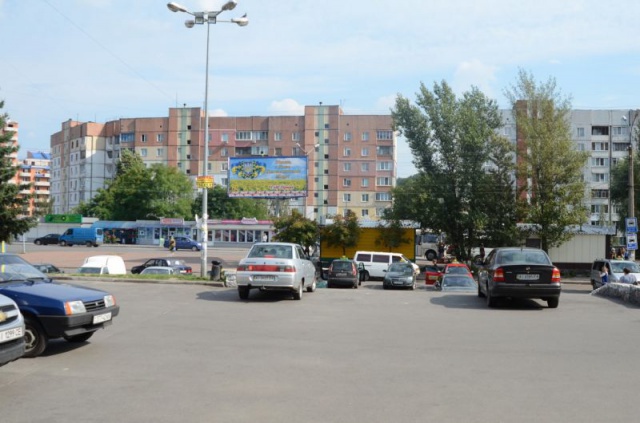 Щит 6x3,  м. Обухів», вул..Київська, 117,  біля супермаркета "Велика кишеня"  (автозупинка  "Піщана")