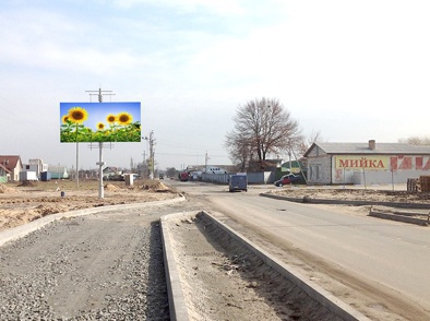 Щит 6x3,  ул. Депутатская, въезд с трассы, напротив Варшавского рынка