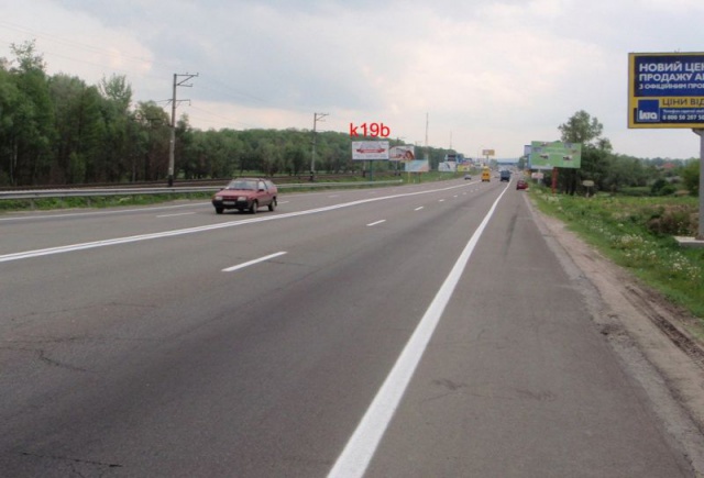 Щит 6x3,  150 м пред поворотом на с. Лісники, 20км+400 ліворуч
