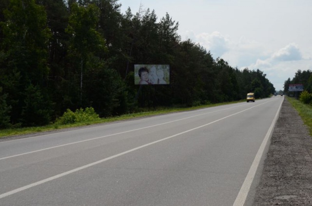 Щит 6x3,  34км + 900м  ліворуч,  поворот на с.Плюты